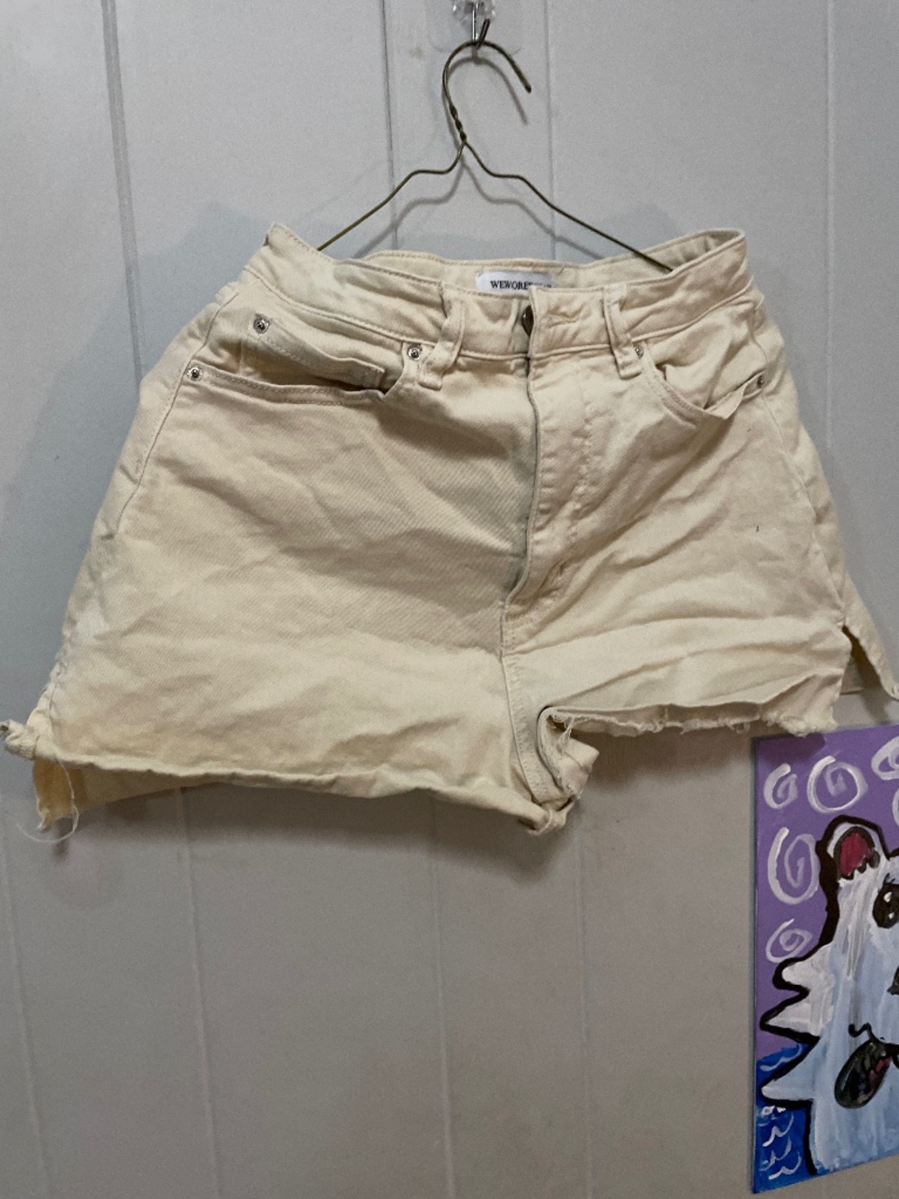 Cream colored distressed Jean short